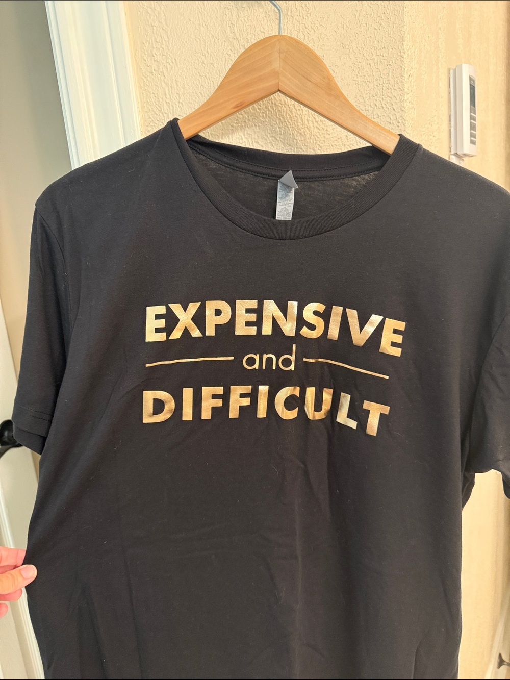 Next Level Apparel Black Tee with Gold 'Expensive and Difficult' Print